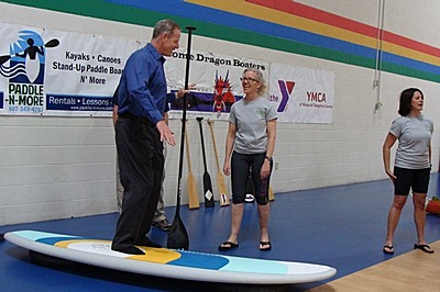 Julie Carmalt teaches basic stand-up paddleboard technique ypaddle_board
