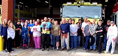 Victims pose for a picture before the drill begins apdd groupshot