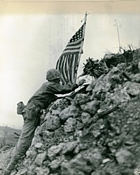 Raising the American Flag after the capture of Suri Castle - From the Photograph Collection, Marine Corps Archives & Special Collections bobboda SuriCastleFlagRaising19450601