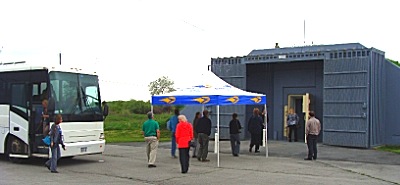 A busload of Tompkins County clerks and other officials toured the paper and electronics storage bunkers at FLTG Park in Romulus Wednesday bunker_paper