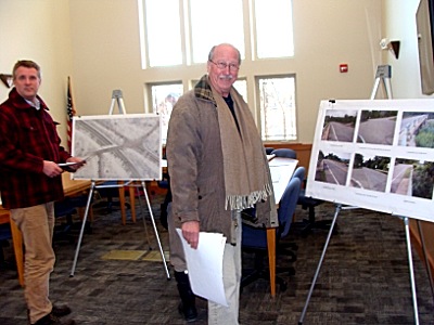 Tompkins County legislator Mike Sigler (left) and Village Trustee John O'Neill view plans for a Cayuga Heights Road bridge repair project. chrbridge_mikejohn