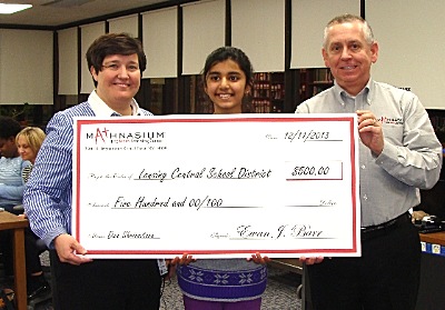 Diva Shrivastava with Superintendent Chris Pettograsso and Ithaca mathnasium owner Ewan Barr ds_withcheck