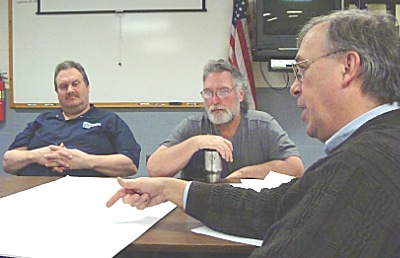 Left to right: Lansing Fire Commission Chairman Robert Wagner and Commissioner Larry Creighton view plans with Architect George Breuhaus fire_station4plans