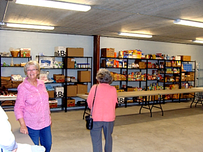 Director Nancy Myers in te new permanent home of the Lansing Food Pantry foodpantry nancy