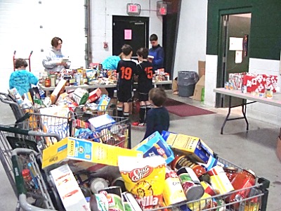 Cartloads of food from Lansing Market, ready to be sorted foodpantrydec carts