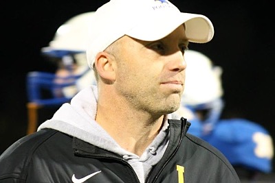 Lansing's Head Coach, John Winslow, beaming, proud of his Pride of Bobcats. football1029 18