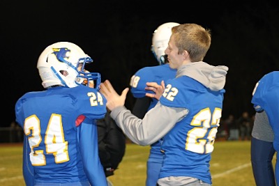 Serious discussion, Freshman #24 Joe Miller- LaBar gets some sound advise from his big brother, #22 Josh. football1029 9