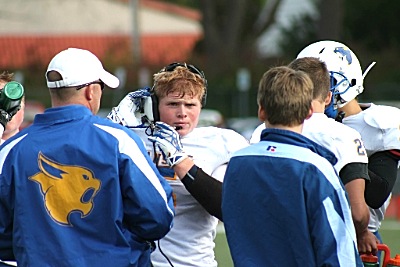 When #5 Brandon Davis isn't tackling, blocking or running the ball, he is helping coach the team. football 1015D