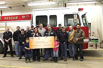 Front Row left to right: Zack White and Abby White Middle Row left to right: Jim Malseed, Beth White, Assistant Chief Brandon White, Logan LaFave, Brandon Ryan Back Row left to right: Mike Shurtleff, Nate Binns, Doug LaFave, Chief Brian Howe, Jack Litzelman Monsanto, Deputy Chief Matt Rejman, Assistant Chief Brad McArthur, Lorin Correll genoa_farmer