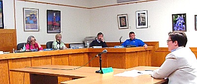 Lansing School Superintendent Chris Pettograsso (right) explains the school septic replacement costs to the Lansing Town Board (left to right) Supervisor Kathy Miller and council members Ruth Hopkins, Ed LaVigne and Doug Dake Chris Pettograsso at Town Board