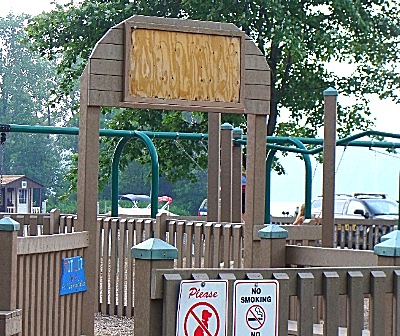 Residents were concerned when they noticed a community-made mosaic sign missing from the Myers Park Playground Tuesday playground_totlot_missing