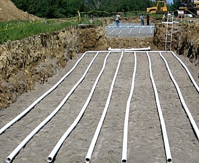 This photo, presented by Tetra Tech Monday, shows construction of a double sand-filter bed. Each of the Lansing district's septic systems will need four of these beds, for a total of 12. schoolseptic_beds