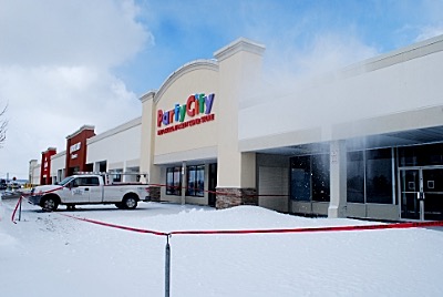 The soon-to-be Advantage Auto parts storefront is blocked Thursday to keep shoppers away from the potentially unsafe area cmroof redtape
