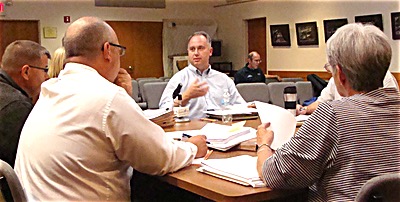 Dan Ferguson (center) presented a draft emergency preparedness plan to the Lansing Town Board Wednesday Dan Ferguson