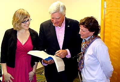 Susie Gutenberger (left) and Emily Franco show Senator Mike Nozzolio an SAT study book in the new teen room funded by state money he gave the library libnoz SATs