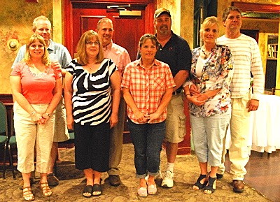 Because all of the scholarship recipients were at the high school prom their parents, (left to right) Mike and Kelly Davis, Don and Karen Hradisky, Sonny and Brenda Arcangeli, and Mark and Doreen Osterman, accepted for them. nlad scholarshipparents