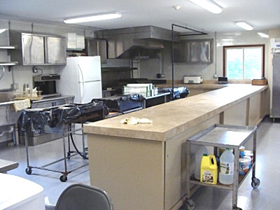Most of the kitchen remains the same, but new counters, cabinets and a safety hood have been installed Station 4
