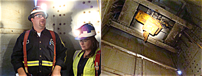 The interior of the elevator is utilitarian. Mine workers stand inside. Light comes from the equipment on their safety helmets. A winch is mounted at the top of the elevator to pull equipment into place. Some vehicles can be hoisted upright to fit in the elevator, while large equipment is cut apart, then reassembled in a shop in the mine. Cargill elevator.