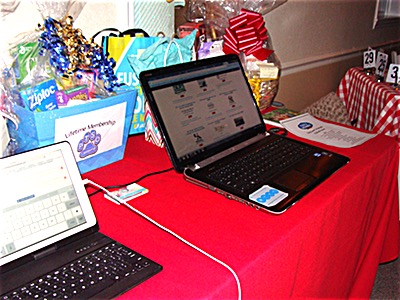 Bidding was still open for the online ayuction using a computer at the Hoedown CDC Hoedown