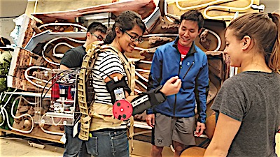 Patients normally have to use rehabilitation equipment like this robotic arm at a hospital, but students made the whole thing fit into a package the size of a back pack so patients could potentially use the technology for physical therapy at home. Rehabilition Arm