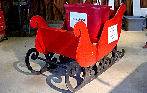 Bring two cans (or more) or boxes of non-perishable foods or non-essential items like toothpaste, soap, tooth brushes, toilet paper, personal products, towels, or diapers to put in Santa's sleigh for the Lansing Food Pantry. Moore tree Farm Food Pantry Collection