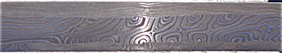 Folding and refolding thousands of layers of steel creates beautiful, intricate patterns. Tony Greenly