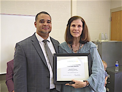 Scott Keenan, assistant vice president and business development officer at Tompkins Trust Company, Marilynne Sommers, award winner ttc Marilynne Sommers