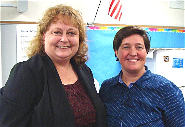 Lorri Whiteman (left) with Lansing Superintendent of Schools Chris Pettograsso, moments after Whiteman's appointment was unanimously confirmed by the Board Of Education in June Lorri Whiteman
