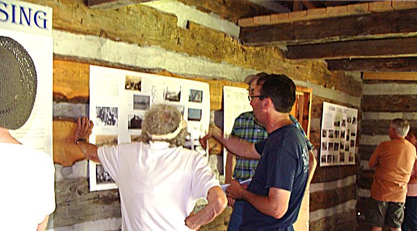 The public was welcomed inside the historic log cabin to view exhibits on Lansing history Log Cabin Exhibits