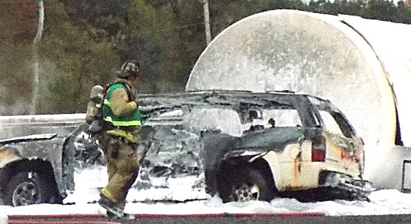 The fire is out, and the plane and the ground is covered with fire suppressing foam Airport Disaster Drill