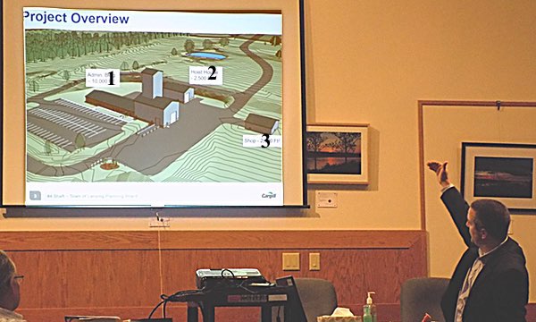 Senior Project Manager William Graycon presented a rendering of the buildings that will enclose the new mine shaft and supporting activities: 1- a 10,000 square foot administration building with showers, a changing room, and offices. The tall barn-like building will enclose the actual elevator structure above the shaft 2- A 2,500 square foot building to house the hoist for the elevator 3- a 2,100 square foot shop Cargill Mine Shaft - William Gracon