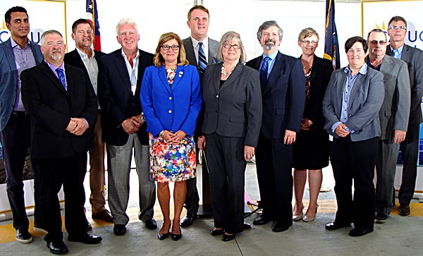 Left to right: Beowolf Energy LLC Executive Vice President of Development and Aquisitions Nazar Kahn, Development Coordinator for IBEW 241 Stacey Black, Cayuga Operating Company Managing Director Michael Enright, New York State Building and Construction Trades President James Cahill, NYS State Senator Pam Helming, Tompkins County Legislator Michael Sigler, NYS Assemblywomen Barbara Lifton, Lansing Town Supervisor Edward LaVigne, Tompkins County Chamber of Commerce President Jennifer Tavares, Lansing School Superintendent Chris Pettograsso, IBEW Business Manager and Financial Secretary Gary Bonker, Cayuga Operating Company VP of Development Jerry Goodenough at Wednesday's solar powered press conference to announce an 18MW solar farm on the Cayuga Power plant site cayugasolar speakers