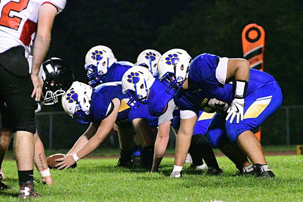 Photo by Bruce Barber football barber1 offensiveline