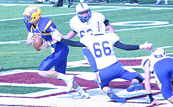Aiden Allison and Mason Butler apply pressure football 6246