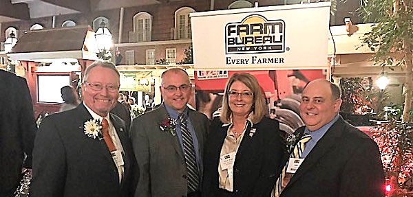 From left to right: New York State Department of Agriculture and Markets Commissioner Richard Ball, New York Farm Bureau President David Fisher, Senator Pam Helming, and NYFB District 3 Director John Sorbello. helming farmbureau