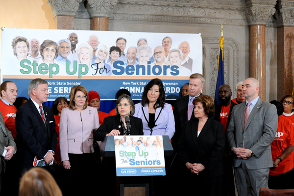 Senator Helming (left of podium), aging advocates and other State Lawmakers from the Senate and Assembly recently rallied to call on legislative leaders to prioritize senior funding in the State Budget helming seniors