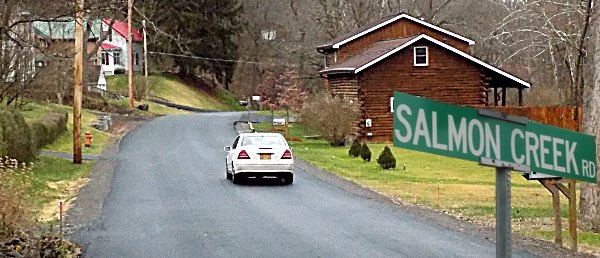 Below-ground drainagecovered by gravel shoulders provides more safety for pedestrians. The section of Salmon Creek Road from Ludlowville Road past red Bridge was made an even width, and less hilly, improving drivers ability to see ahead. and for two cars to safely use the road. Salmon Creek Road, Ludlowville