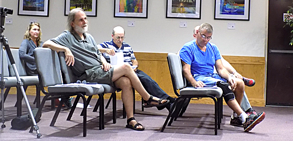 Joe Wetmore (left, in gray) Joe Wetmore