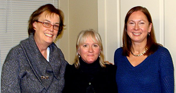 Lisa Campbell (center), and R. C. Buckley Elementary School English Language Specialists Cindy Van Duren (left) and Pam Bryce (right) were at the Lansing Lions Club meeting to talk about the successes of the Summer Reading Program, for which the Lions donated $2,000. Summer Reading Camp