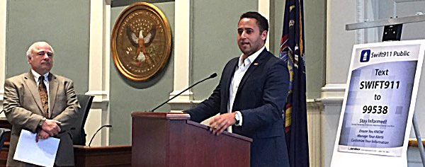 Tompkins County Legislature Chair Michael Lane (left) and Ithaca Mayor Svante Myrick explain how the Swift911 alerts system will benefit city and county residents Michael Lane and Svante Myrick