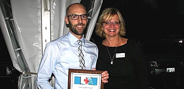 Mike Smith accepting red cross award tcat smith redcross