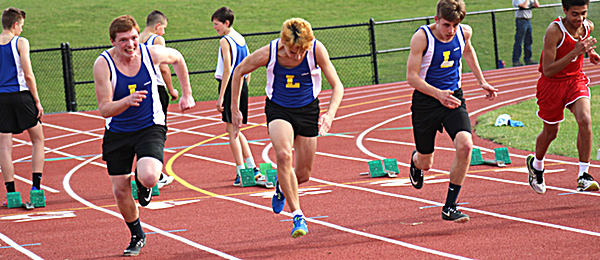 (Left to right): Mike LaPar, Sam Panzer, and Ryan Bennett-Hamm taking off out of the starting blocks. Photo by Steve Kuramoto track Trackpie1