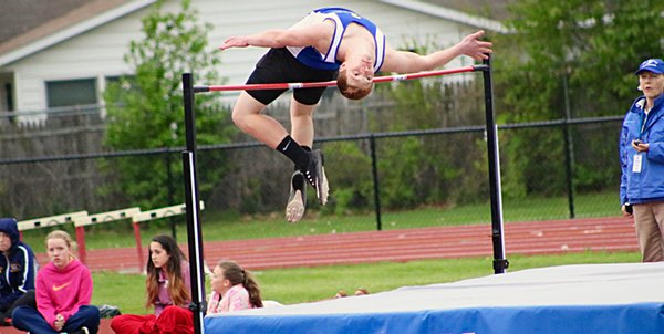 Junior Mike Lapar finished third in the high jump. Photo by John Lawrence Mike Lapar