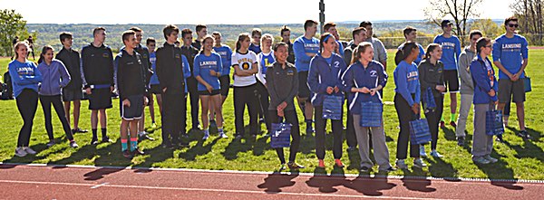 Underclassmen applaud their senior teammates. Photo by Kristen Burt Seniors