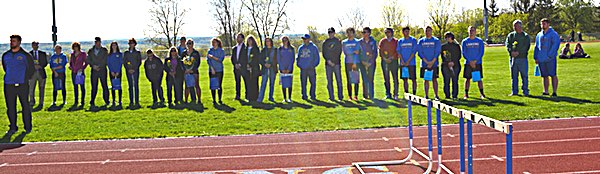 The ten graduating track and field seniors and their families. Photo by Kristen Burt Track Seniors