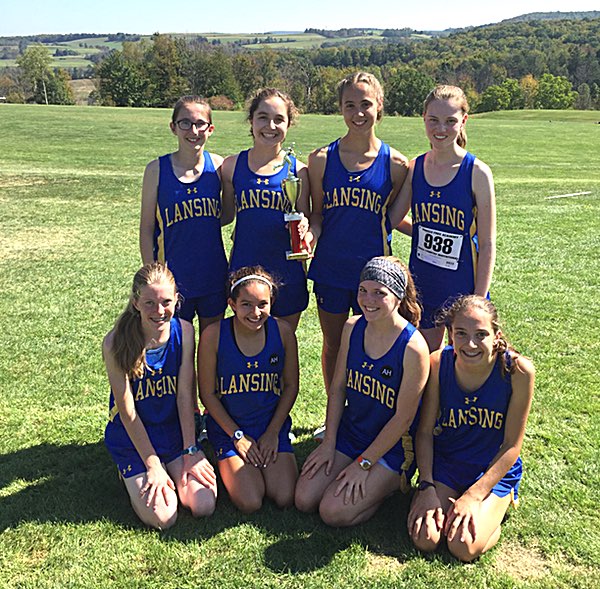 The Lansing varsity girls XC team received a trophy for their 6th place finish at the Owego Invitational. Photo by David Pollack xc teamshot9