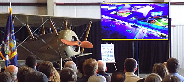 Ithaca Aviation Past and Future - The Thomas Morse Scout ('Tommy') that was restored and made a historic centennial flight two weeks ago, and a rendering showing the front of the Ithaca-Tompkins International Airport, to be completed by the end of next year. Ithaca Aviation Past and Future