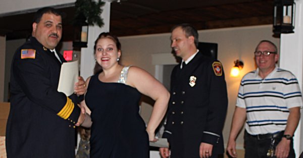 Deputy Chief Brad George congratulates Chiefs Award winners Rebecca Drake, Nelson Golden and Terry Jackson Chiefs Award