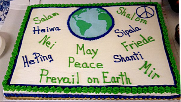 This cake was donated by Lansing Market to celebrate one year of interfaith dinners Interfaith Community Dinner