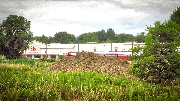 The 20-unit Lansing Meadows project is envisioned as a senior community where residents can walk to shopping and amenities. It was proposed as a condition of building the BJ's Wholesale Club building in 2012 Lansing Meadows - Mall Senior Housing